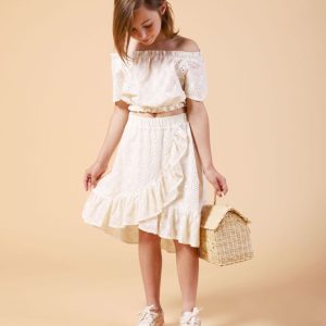 Dixie falda mini monocolor perforada con volantes