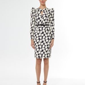 Carla Ruiz vestido crep cinturon banco/negro