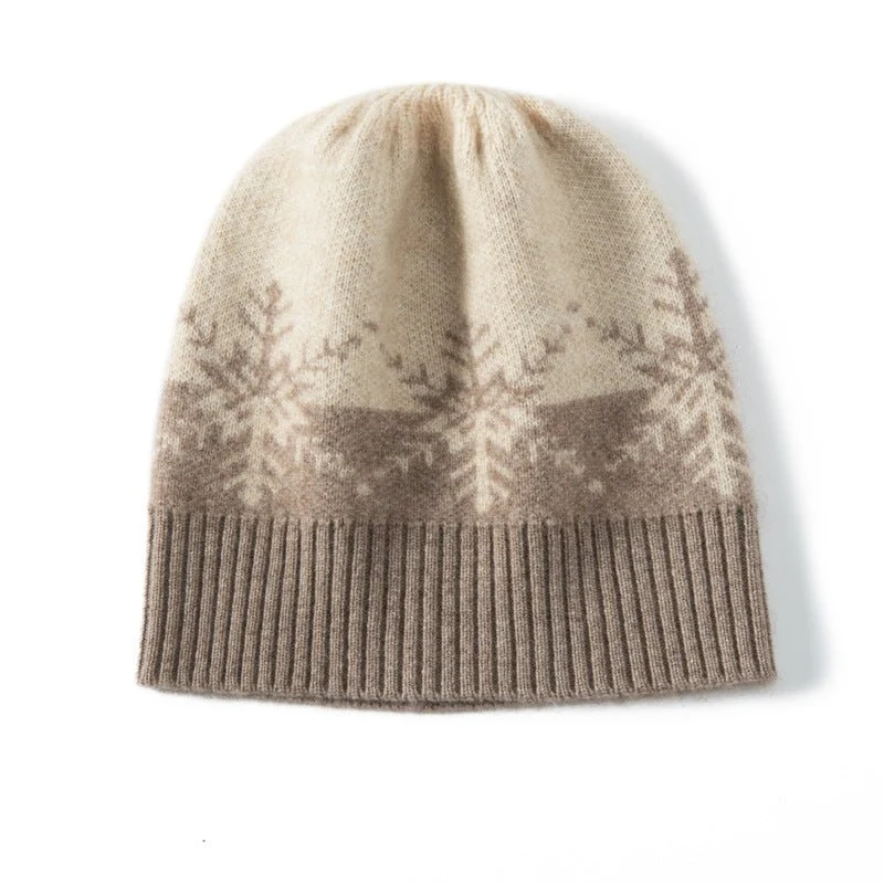 Gombado de gorro de cachemir de Winter Wonderland con estampado de copos de nieve